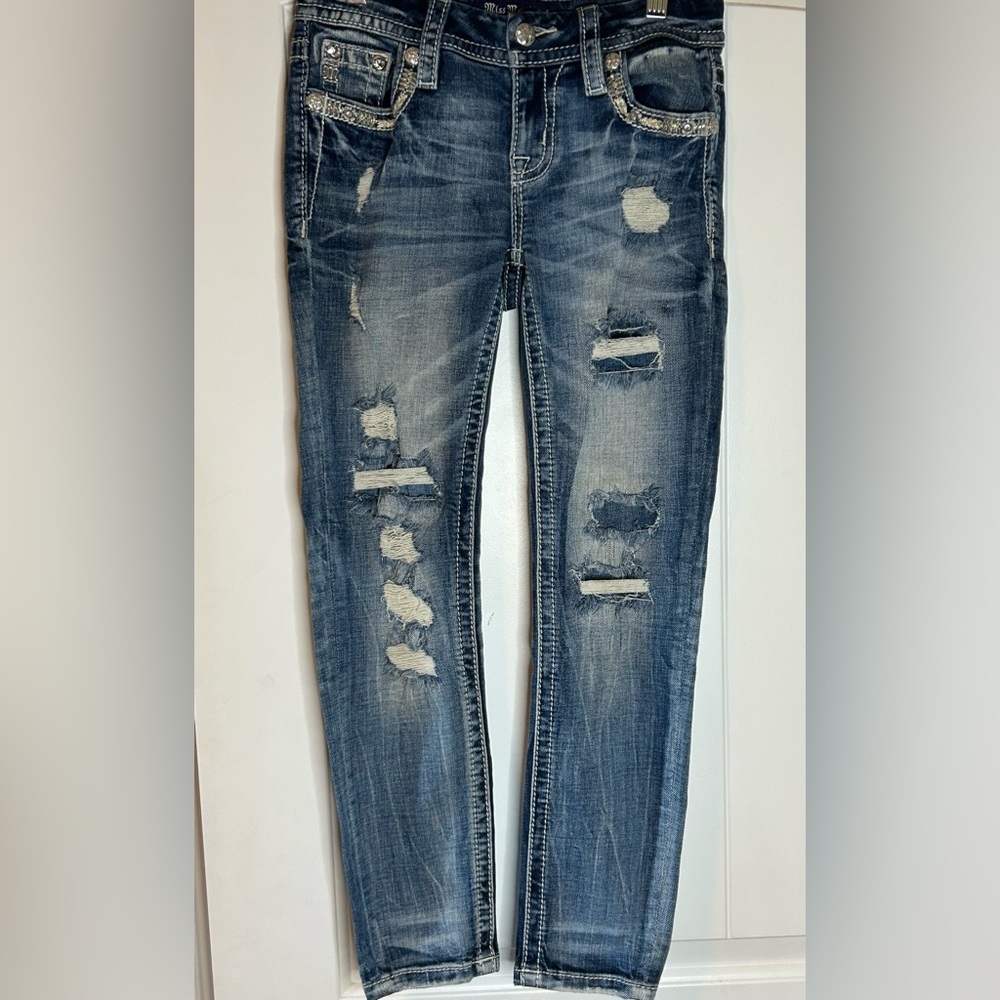 Distressed Blue Jeans